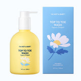 Yellow bottle of 'I'm Not a Baby' top to toe wash with a blue box featuring a daisy design on a white background.