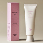 Hand cream tube and packaging with 'Fleurage 081' branding on a beige background