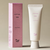 Hand cream tube and packaging with 'Fleurage 081' branding on a beige background