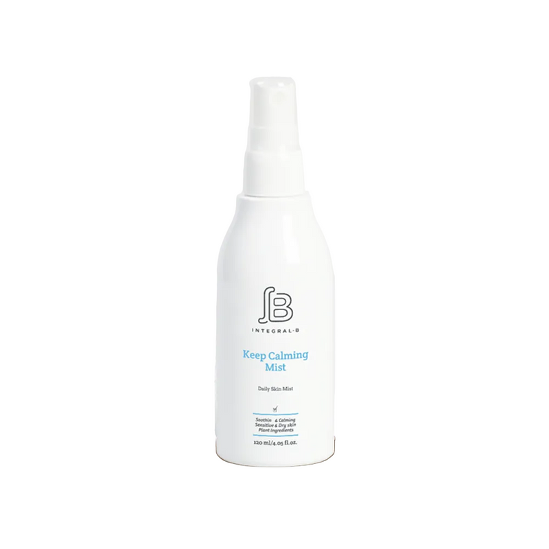 A white spray bottle labeled 'Integral B Keep Calming Mist' against a transparent background.